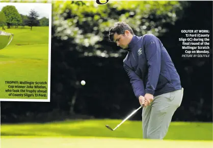  ?? PICTURE BY GOLFFILE ?? TROPHY: Mullingar Scratch Cup winner Jake Whelan, who took the trophy ahead of County Sligo’s TJ Ford.
GOLFER AT WORK: TJ Ford (County Sligo GC) during the final round of the Mullingar Scratch Cup on Monday.