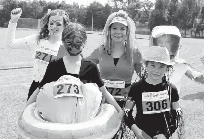  ??  ?? Above: The fancy dress section was popular with many people bravely tackling the courses in an array of costumes.
Showing a lot of imaginatio­n in dressing up are (from left): Tessa Grubb, 12, Jordyn Cahill, 11, Lee Bell, Mitchell Cahill, 7 and Airi...