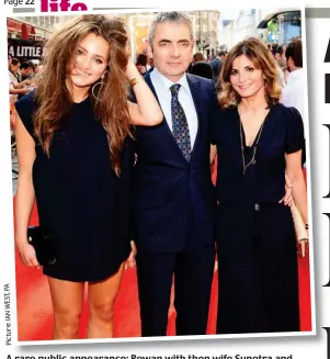  ??  ?? A rare public appearance: Rowan with then wife Sunetra and daughter Lily at the Johnny English Reborn premiere in 2011