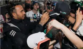  ??  ?? Lewis Hamilton signs autographs at the Autódromo Hermanos Rodríguez in Mexico City. Photograph: Alfredo Estrella/AFP via Getty Images