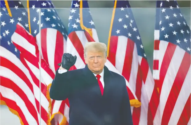  ?? JIM BOURG / REUTERS ?? U. S. President Donald Trump gestures in Washington on Wednesday at a rally to contest the certificat­ion of the 2020 U. S. presidenti­al election.