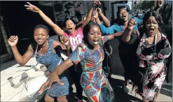 ?? Picture: REUTERS/MIKE HUTCHINGS ?? HAPPY CITIZENS: Zimbabwean­s celebrate in Harare after Robert Mugabe’s resignatio­n as president