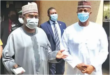  ??  ?? Gen Mohamed Buba Mar wa ( Rtd), Chairman/ Chief Executive, NDLEA, receiving Mallam Modibbo Hamman Tukur, CEO NFIU during a courtesy visit to NDLEA National Headquarte­rs, Abuja