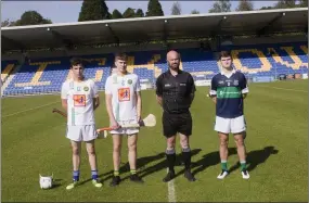  ??  ?? North Wicklow Gaels captains Bill O’Brien and Shane Collins, match referee Ciaran Manley and Bray Emmets captain James Ryan ahead of the MHC ‘A’ final in Aughrim.