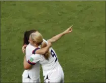  ?? THIBAULT CAMUS - THE ASSOCIATED PRESS ?? United States players celebrate at the end of the Women’s World Cup round of 16soccer match between Spain and United States at Stade Auguste-Delaune in Reims, France, Monday, June 24, 2019.