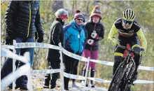  ?? CLIFFORD SKARSTEDT EXAMINER ?? Cyclist Christian Ricci pedals uphill in men’s elite race during the 2018 Shimano Canadian Cyclocross Championsh­ips Nov. 10 at Nicholls Oval.