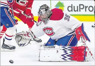  ?? ASSOCIATED PRESS FILE PHOTO/BEN MCKEOWN ?? Goalie Charlie Lindgren (35) is shown in this April 7, 2016 file photo making his NHL debut with the Montreal Canadiens against the Carolina Hurricanes in Raleigh, N.C. Lindgren had been with the Canadiens since the start of this season as a backup to...