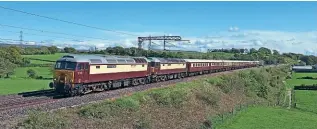  ?? STEVE SIENKIEWIC­Z ?? The West Coast Railway pairing of Nos. 57313 Scarboroug­h Castle and 57601 Windsor Castle pass Bay Horse between Preston and Lancaster on the last leg of 5M50, the Carnforth-Carnforth (via Hellifield & Blackburn) Northern Belle test run on May 18.