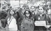  ?? Kevin C. Downs New York Daily News ?? PROTESTERS attend a New York rally after an attorney’s public rant against Spanish speakers.