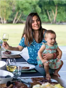  ??  ?? ABOVE: Andrea Vijande Grace (seen here with her daughter Naiomi) came from Argentina to Rathmoy. Her Argentinia­n barbecue includes delicious, slow- cooked empanadas. LEFT: Rathmoy Lodge, alongside the river on a sheep and cattle farm, is owned by Mark and Andrea Grace. It offers accommodat­ion, pheasant shooting and is a wedding venue.