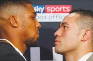  ??  ?? Anthony Joshua and Joseph Parker will slug it out in Cardiff on Saturday for the right to meet Deontay Wilder in a heavyweigh­t unificatio­n bout. (AFP)