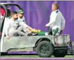  ?? AFP ?? Aaron Rodgers of the Green Bay Packers (in cap) rides a cart to the locker room after being injured in the game against the Minnesota Vikings on Sunday.