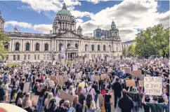  ??  ?? Crowds at a Black Lives Matter protest at Belfast City Hall last week and (left) Pastor Barrie Halliday