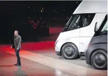  ?? VERONIQUE DUPONT/AFP/GETTY IMAGES ?? Tesla chairman and CEO Elon Musk unveils the new electric Semi truck for buyers and journalist­s last week.