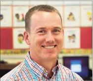  ?? Christian Abraham / Hearst Connecticu­t Media ?? Booth Hill School student teacher Matt McAloon poses in a classroom at the school last week in Shelton.