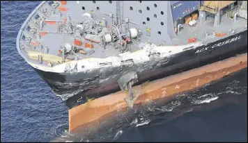  ?? IORI SAGISAWA / KYODO NEWS ?? Damage is evident on the Philippine-registered container ship ACX Crystal on Saturday after its collision with the USS Fitzgerald.