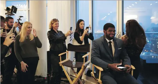  ??  ?? Canadiens star P. K. Subban traded in his jersey for a jacket and tie to shoot the Spring 2016 campaign for Canadian retailer RW & CO.