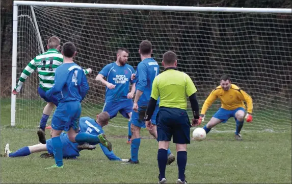  ??  ?? Dan O’Hare fires Aughrim Rangers in front against Conary United.