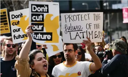  ?? AFP/Getty Images ?? Los Angeles Times Guild journalist­s rally in front of City Hall to protest against layoffs on 19 January 2024. Photograph: Patrick T Fallon/