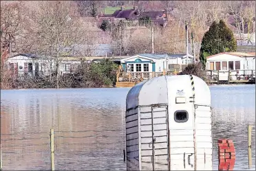  ??  ?? A submerged horse box as the main road into Yalding was left under water earlier this year