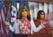  ?? J. SCOTT APPLEWHITE — THE ASSOCIATED PRESS ?? Rep. Lucy McBath, D-Ga., whose son was a victim of gun violence, joins Speaker of the House Nancy Pelosi, D-Calif., at a news conference at the Capitol in Washington on passage of gun violence prevention legislatio­n.