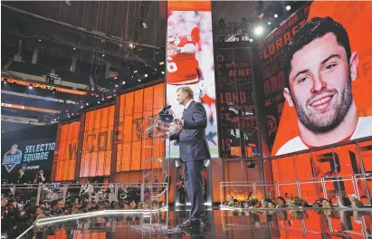  ?? PHOTOS BY DAVID J. PHILLIP/THE ASSOCIATED PRESS ?? Commission­er Roger Goodell speaks Thursday after the Cleveland Browns selected Oklahoma’s Baker Mayfield as the No. 1 pick of the draft in Arlington, Texas.