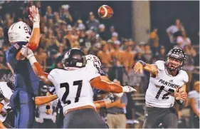  ?? STAFF PHOTO BY DOUG STRICKLAND ?? Ridgeland High School quarterbac­k Tanner Hill passes during last month’s game against Heritage in Ringgold. The Panthers will be Region 6-AAAA’s No. 1 seed for the playoffs.