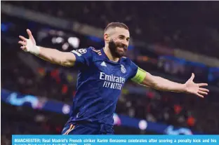  ?? ?? MANCHESTER: Real Madrid’s French striker Karim Benzema celebrates after scoring a penalty kick and his team’s third goal on April 26, 2022. —AFP