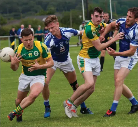  ??  ?? Templenoe’s Martin Reilly in action against George Bastible, John Mitchels in the County Senior Football League Division 1 Round 9 at John Mitchels GAA Club, Tralee on Sunday