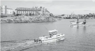  ??  ?? Boat and sea planes share the Inner Harbour. Victoria Coun. Ben Isitt says the airport has been operating under draft regulation­s for almost two decades.