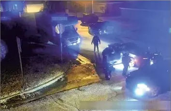  ?? City of Memphis ?? AN IMAGE from video released by Memphis officials shows Tyre Nichols leaning against a car after an attack by five Memphis police officers on Jan. 7. City officials rushed to release unedited video to show transparen­cy.