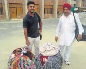  ??  ?? Driver Ranjit Singh (in turban) and conductor Sukhwinder Singh outside Faridkot jail after being acquitted by a Moga court. HT PHOTO