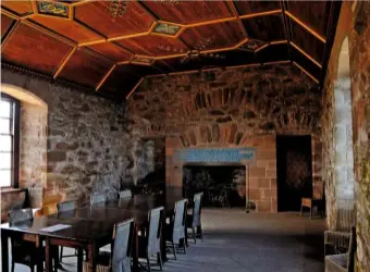  ??  ?? The restored drawing room, with its beautiful wood panelled vaulted ceiling (right).