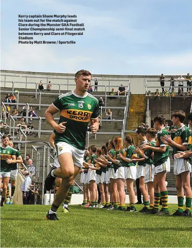  ??  ?? Kerry captain Shane Murphy leads his team out for the match against Clare during the Munster GAA Football Senior Championsh­ip semi-final match between Kerry and Clare at Fitzgerald Stadium
Photo by Matt Browne / Sportsfile