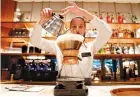  ?? REUTERS ?? AN EMPLOYEE prepares a coffee inside the new Starbucks Reserve Roastery flagship in downtown Milan, Italy, Sept. 4.