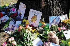  ?? Photograph: Bing Guan/Reuters ?? A memorial in Central Park for Flaco, the Eurasian eagle owl who died just over a year after his escape from a vandalized zoo enclosure.