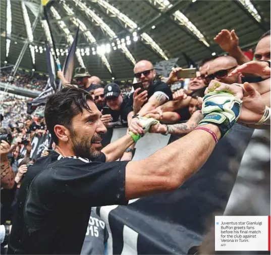  ?? AFP ?? Juventus star Gianluigi Buffon greets fans before his final match for the club against Verona in Turin.