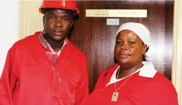  ?? Photo: Sue Maclennan ?? EFF PR councillor­s Mzwandile Qotoyi and Nomakhwezi Mtwa attended Wednesday’s Special Council Meeting at Makana Municipali­ty in the party’s trademark red overalls.