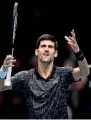  ?? Reuters ?? Djokovic celebrates winning his group stage match against John Isner. —