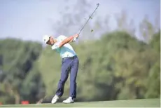  ?? — AFP ?? Xander Schauffele of the US hits a shot during the final round of the WGC-HSBC Champions tournament in Shanghai.