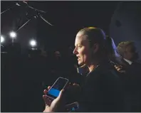  ?? CP PHOTO ?? Minister of Environmen­t and Climate Change Catherine McKenna speaks to reporters in the foyer of the House of Commons on Parliament Hill in Ottawa on Tuesday.