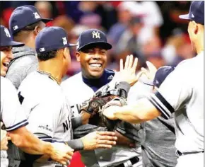  ?? GREGORY SHAMUS/GETTY IMAGES/AFP ?? New York Yankees players celebrate after beating the Cleveland Indians in Game 5 of the American League Divisional Series on Wednesday.