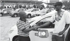  ??  ?? Choppies human resources manager Mr Sipho Mpofu hands over Chevrolet car keys to Choppies grand prize winner Mr Cleto Imbayago at Nkulumane Complex, Bulawayo yesterday. (Picture by Eliah Saushoma)