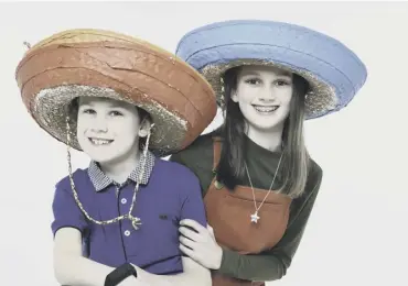  ??  ?? 0 Oscar and Chloe Lowther feature in the Wear a Hat Day campaign
