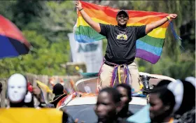  ?? Rebecca Vassie / Associated Press ?? Ugandans take part in the nation’s third annual pride parade in Entebbe.