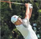  ?? RAYMOND CARLIN III/USA TODAY SPORTS ?? K.H. Lee successful­ly defended his AT&T Byron Nelson title with a one-shot win over Jordan Spieth.