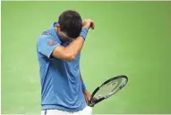  ?? GETTY IMAGES ?? Novak Djokovic of Serbia reacts during his loss to Stan Wawrinka of Switzerlan­d in the U.S. Open final.