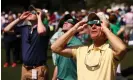  ?? Maddie Meyer/Getty Images ?? Augusta patrons use glasses to view the solar eclipse before the 2024 Masters. Photograph: