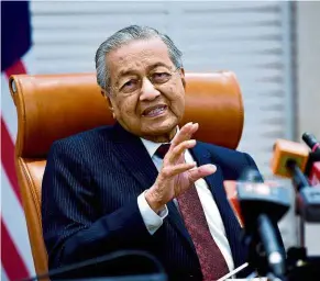  ??  ?? His take on things: Dr Mahathir holding a special press conference marking Pakatan’s first-year anniversar­y as the government. — Bernama