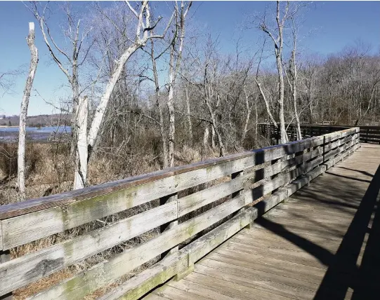  ?? WALTER NICKLIN For The Washington Post ?? A boardwalk leads over wetlands to the historic Aquia Creek quarry, which yielded stone for the original U.S. Capitol.